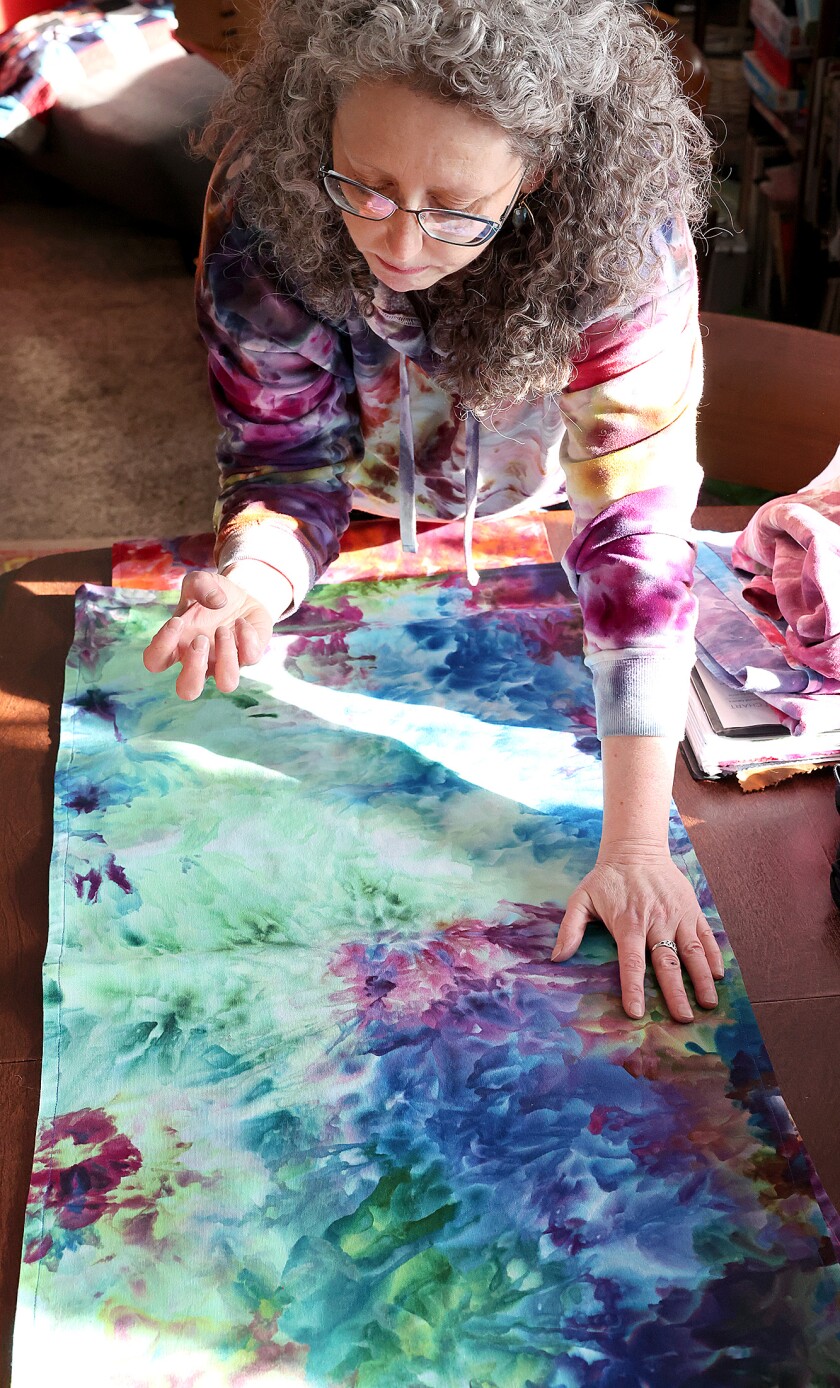 Woman talks about tye dying.