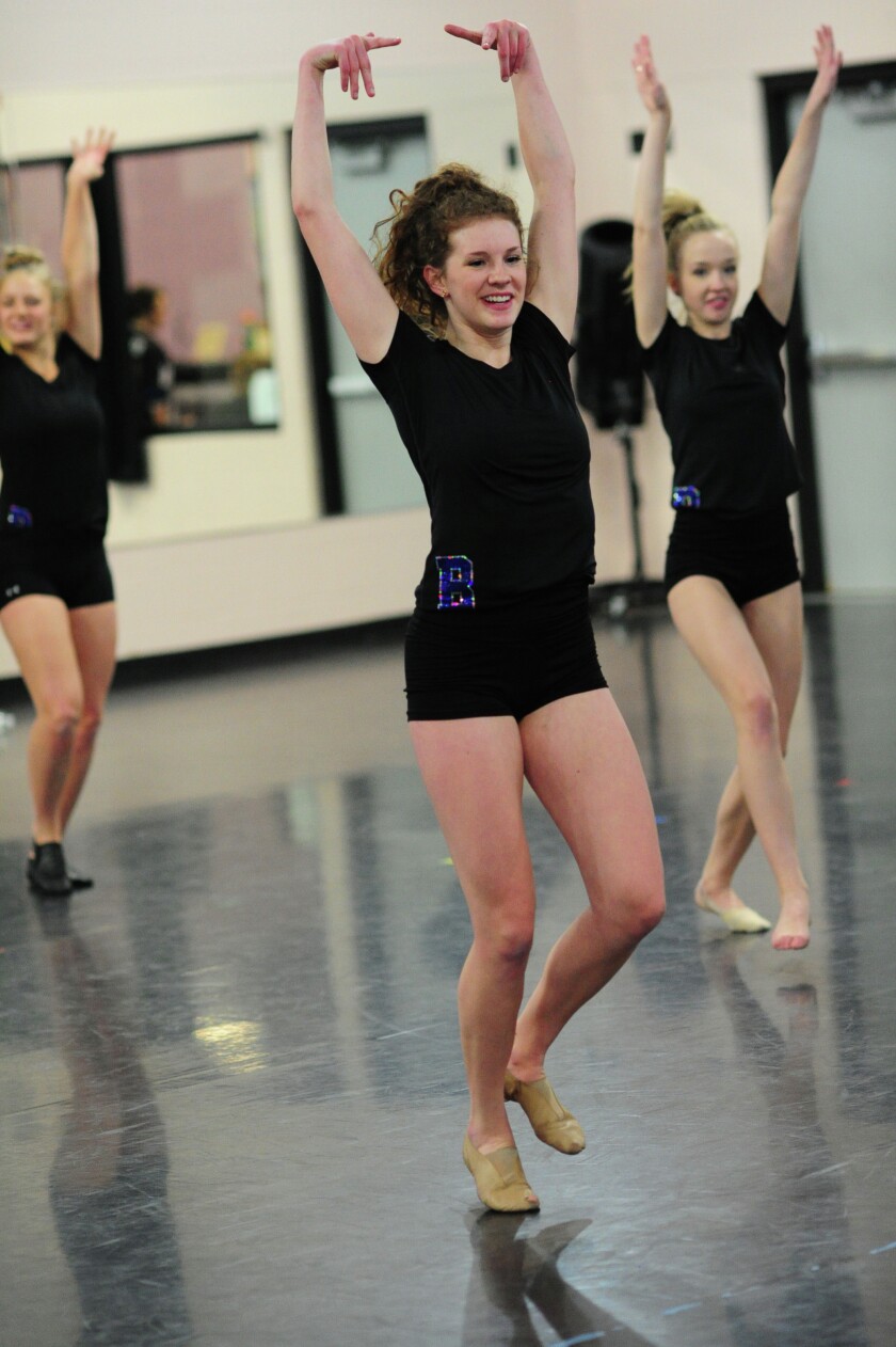 Marissa Knopf practices her dance routine this week as the Warrior Dance Team prepares for their first meet of the season Saturday against Maple Grove. Brainerd Dispatch/Steve Kohls