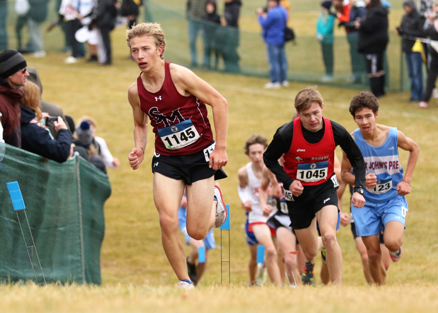 Issiah Tabbat runs in the Class 1A state meet