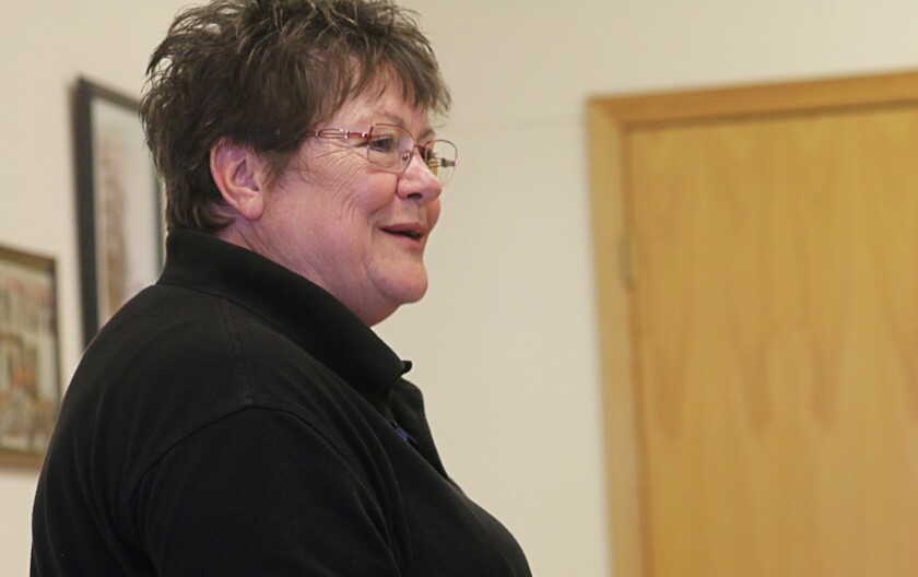 Betty Jean Mertens, supervisor and educator with the Lyman county Parents as Teachers program, addresses a crowd of more than 30 people Friday night at the Kennebec Fire Hall during a gathering to mark the end of the PAT program. (Caitlynn Peetz/Republic)