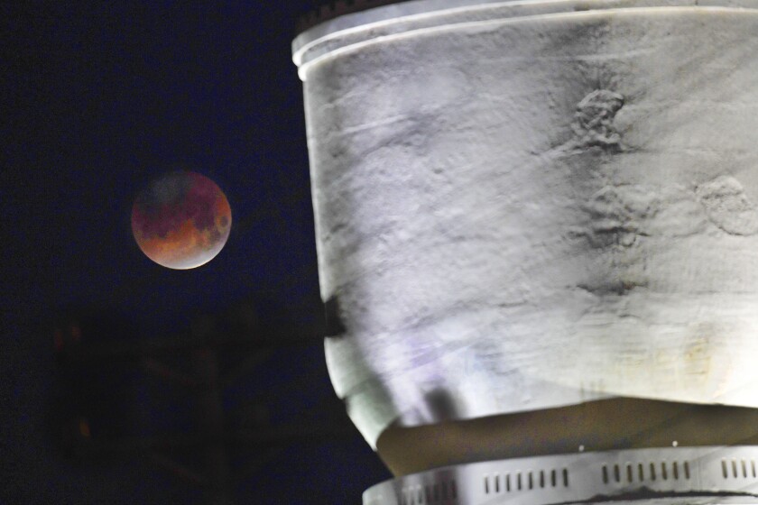 The super blue blood moon sets beside Brainerd’s historic water tower early Wednesday morning. The combination of lunar eclipse, blood moon and super moon was visible in the western hemisphere for the first time in 152 years. Steve Kohls / Brainerd Dispatch