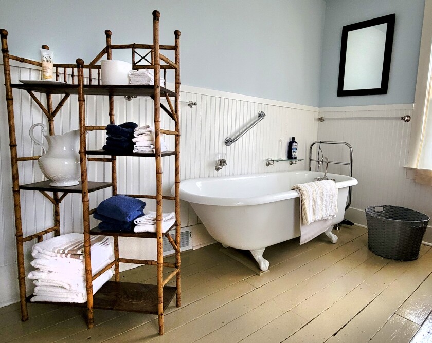 A clawfoot tub is featured in the second-floor bathroom of the Historic Scott House.