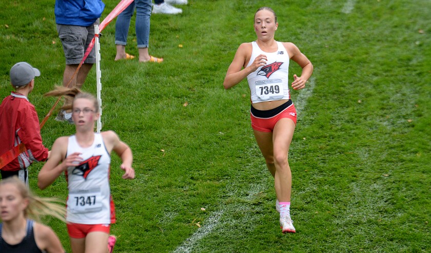 Willmar junior Hannah Quinn, 7349, runs downhill during the Willmar Invitational on Saturday, Oct. 1, 2022 at Eagle Creek Golf Club in Willmar.