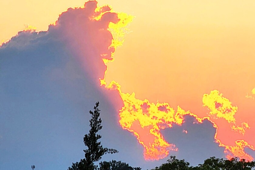 Clouds shaped like a fire-breathing dragon