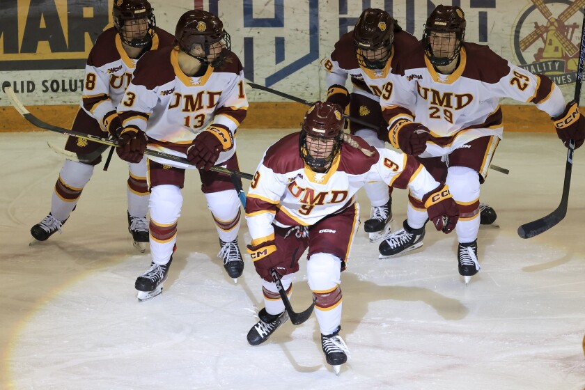 college women play hockey