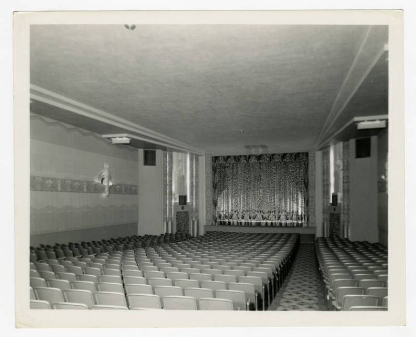 The inside of an elaborate movie theater.