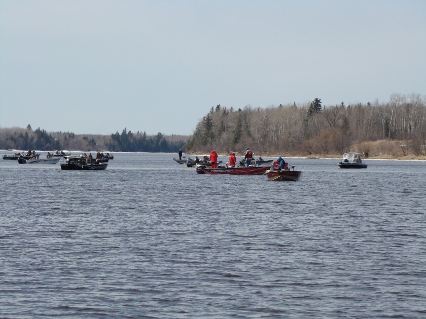 fishing-boats-rainy-river.jpg