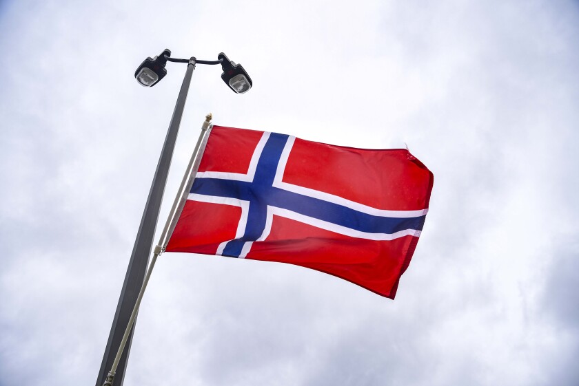 Erica Dischino/TribuneThe flag of Norway flew over Sunburg Sunday during the annual Syttende Mai celebration.