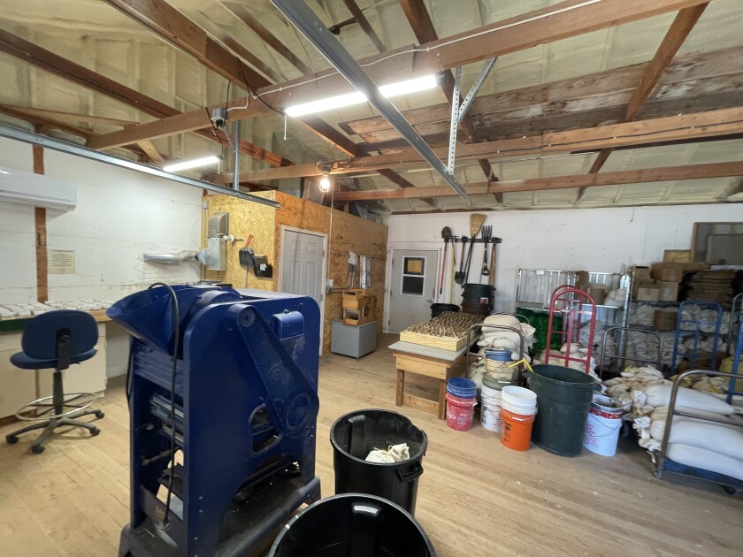 An interior view of the lab at North Dakota State University's Dickinson Research Extension Center shows a tight space where scientists work.