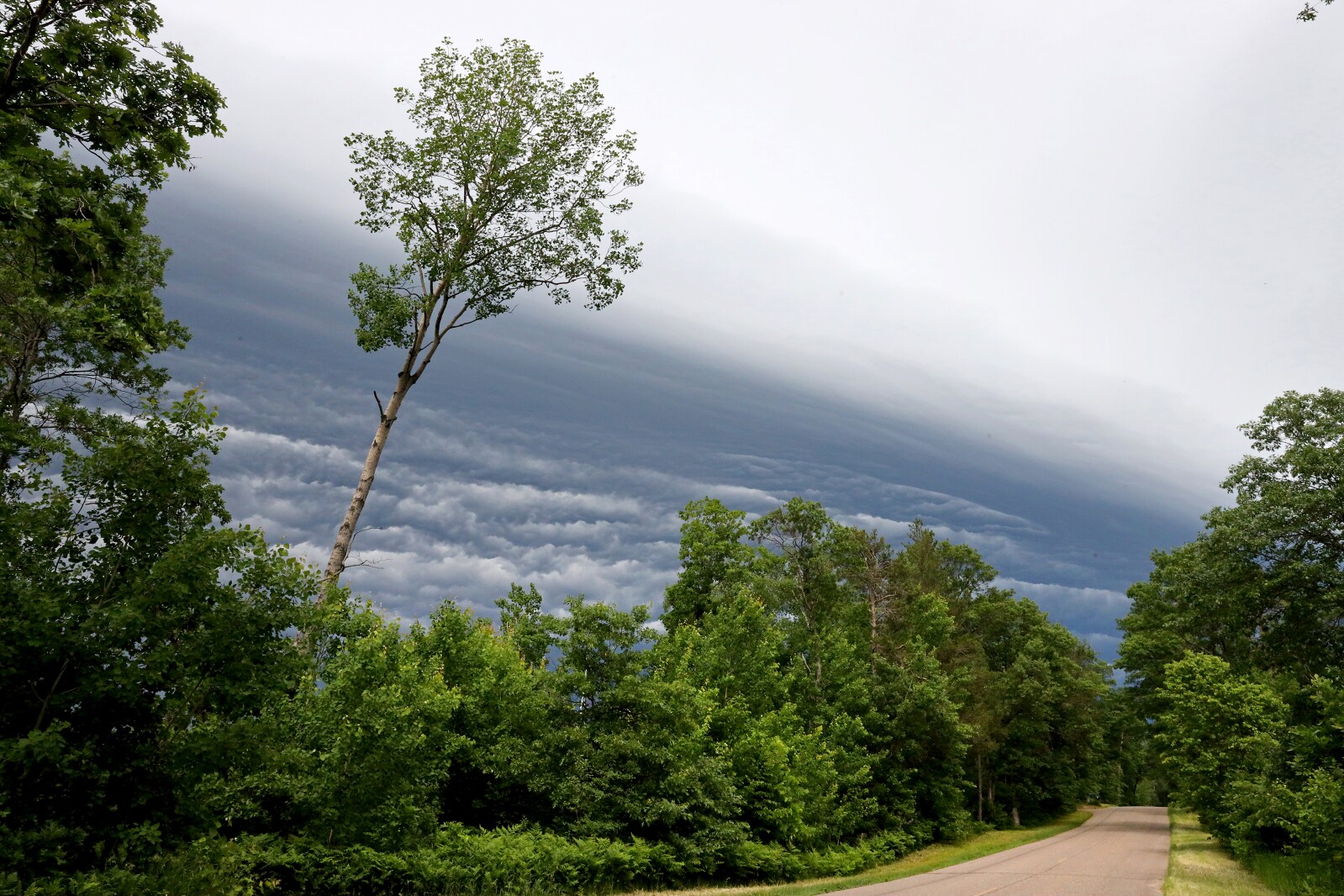 Dramatic looking storm clouds move through the area Saturday, June 18, 2022, in the Brainerd lakes area.