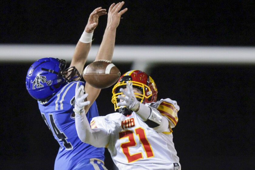high school boys playing football