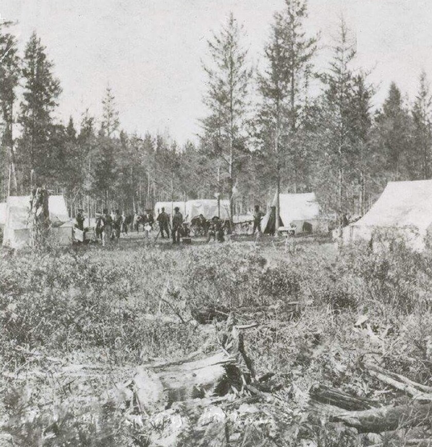 Northern Pacific Railroad survey crew in 1870 along the east bank of the Mississippi River