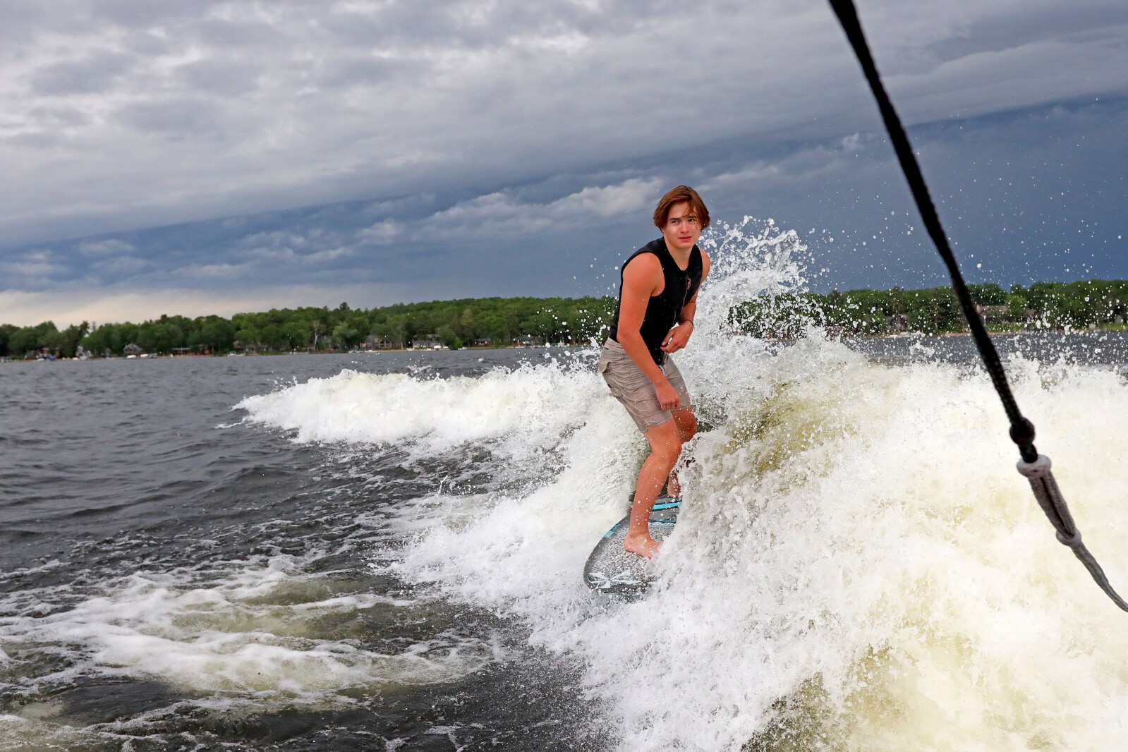Parker Linn demonstrates wake surfing for people during the ninth annual Bar Harbor In-Water Boat Show on Saturday, June 18, 2022, on Gull Lake. Watercraft for the boat show were brought by Nisswa Marine and Minnesota Inboard Water Sports and a Wake Responsibly event taught attendees boat safety and responsibility.