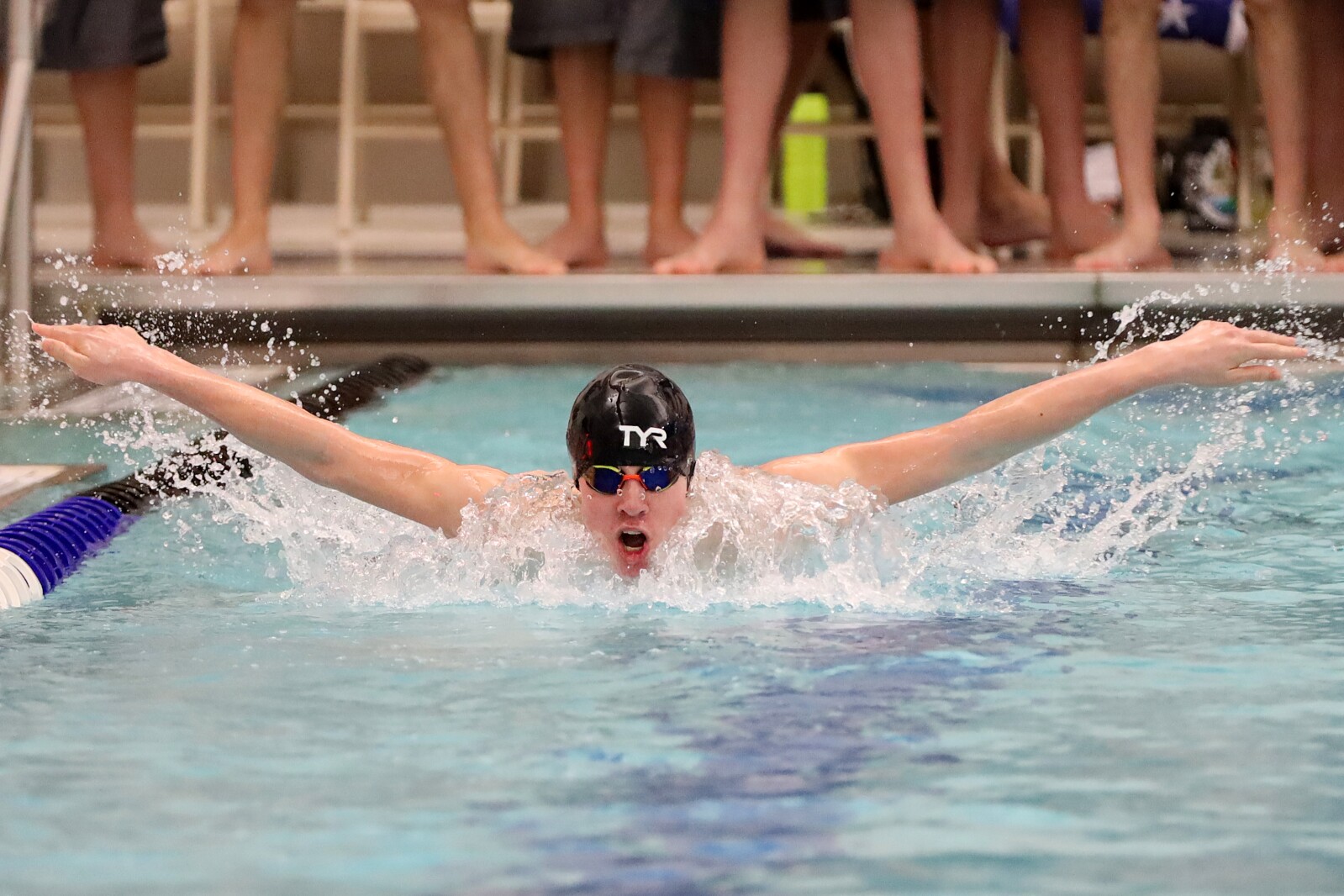 Swimmer in the pool competing.