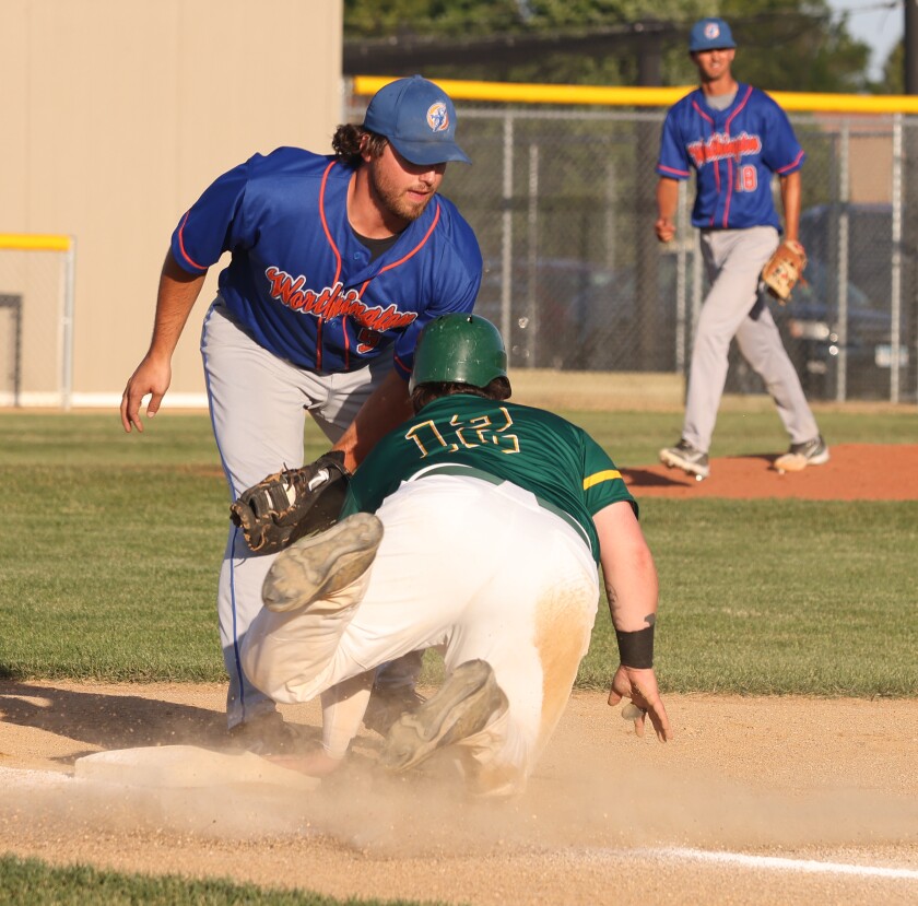 Worthington Cubs first baseman Tyler Linder tags Adrian A's Jakob Olson for an out after Olson's led off of first base catches the eye of Cubs pitcher Brock Bruns (18) Wednesday evening.