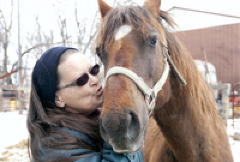 Deb Hannestad gives some love to Karmel