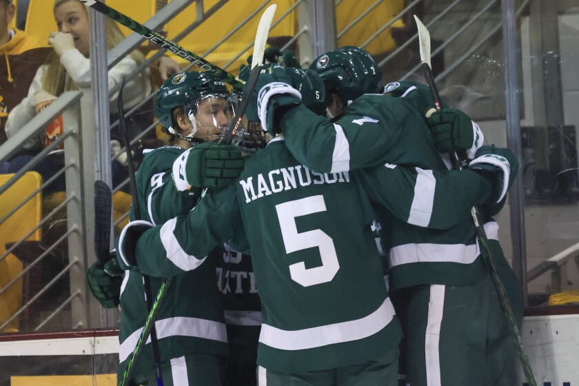 college men play hockey