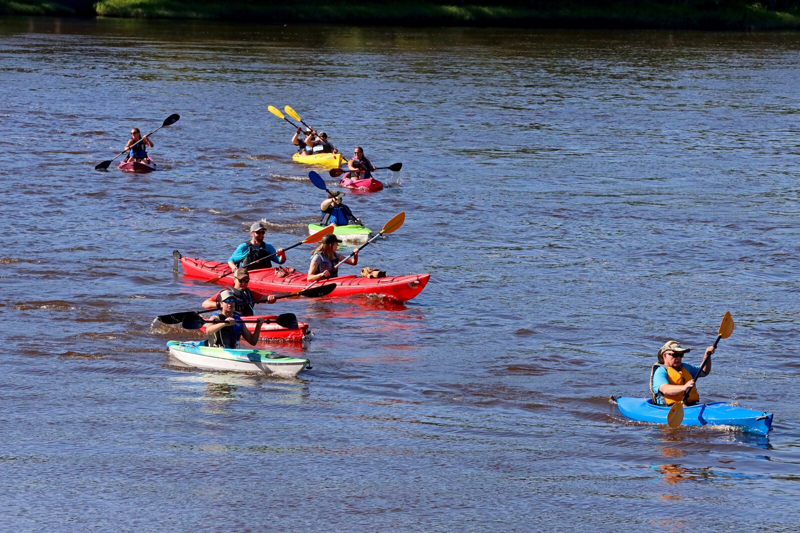Racers head up the Mississippi River on Saturday, July 30, 2022, going from Kiwanis Park to Evergreen Landing and back again in Brainerd.