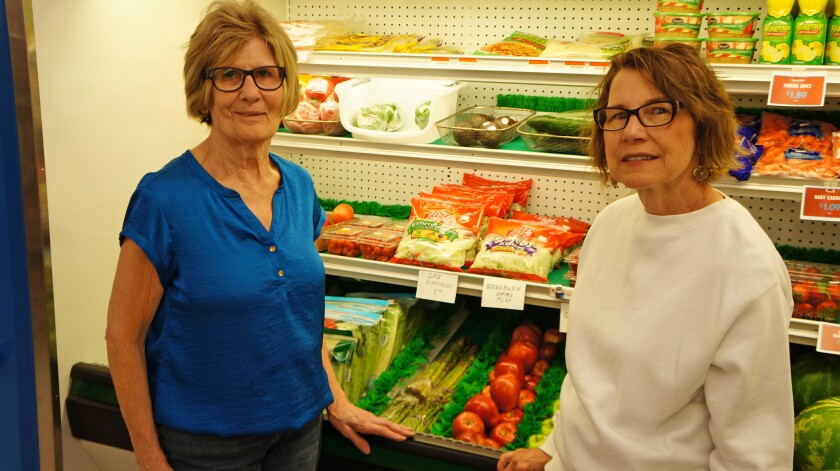 Joy Schlegel, left, and Patti Patrie are some of the people that have made the Bowdon Community Grocery a reality. (Chris Olson / Forum News Service)