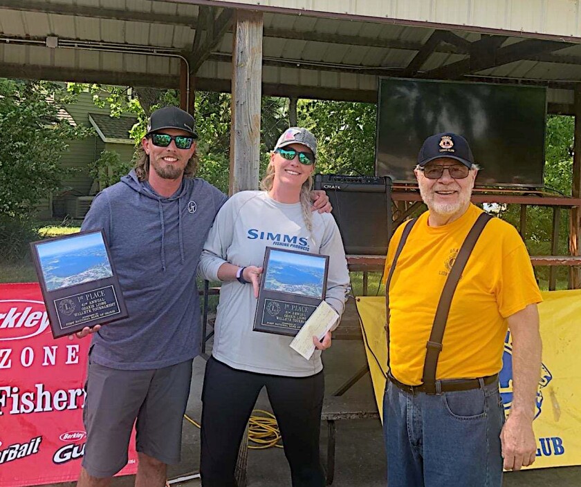 Tyler and Cate Wolden with Osakis Lions President Mark Reicks.jpg