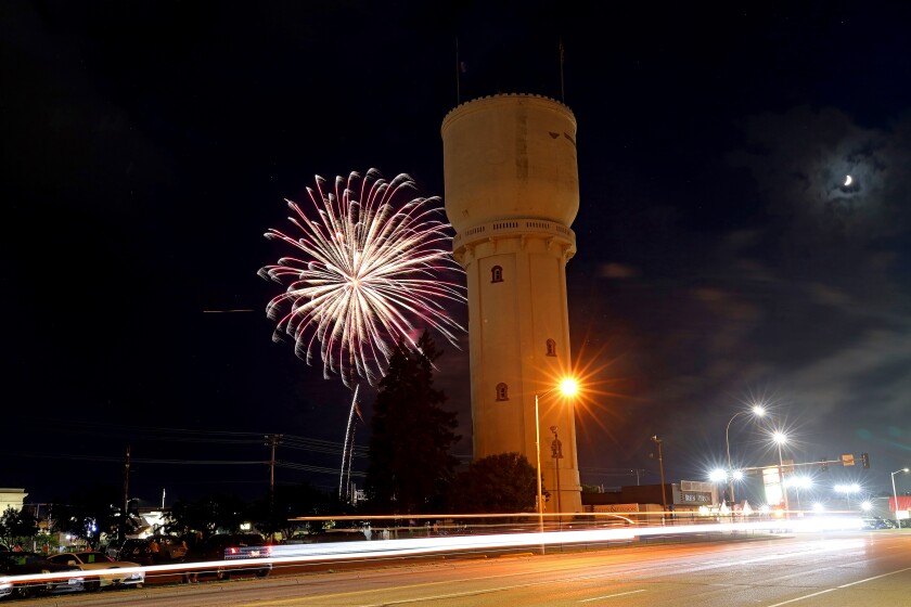 Fireworks light up the sky for the Fourth of July on Monday, July 4, 2022, beyond the historic water tower in Brainerd.