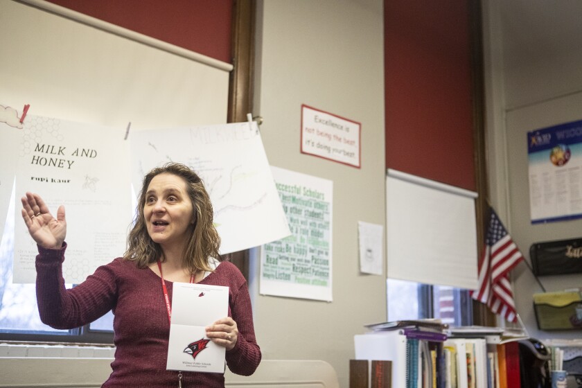 Communication and English teacher Kerrie Speer explains the importance of letters to teachers and students in Ukraine to her senior students at the Area Learning Center on Wednesday, April 20, 2022.