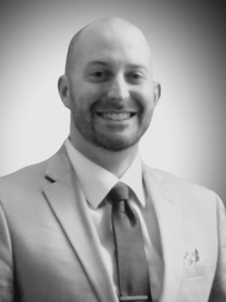 A picture of a man in a suit.