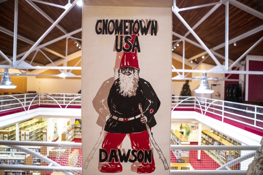 Dawson is referred to as "Gnometown USA" in a banner hanging in the mezzanine of the Dawson Public Library.