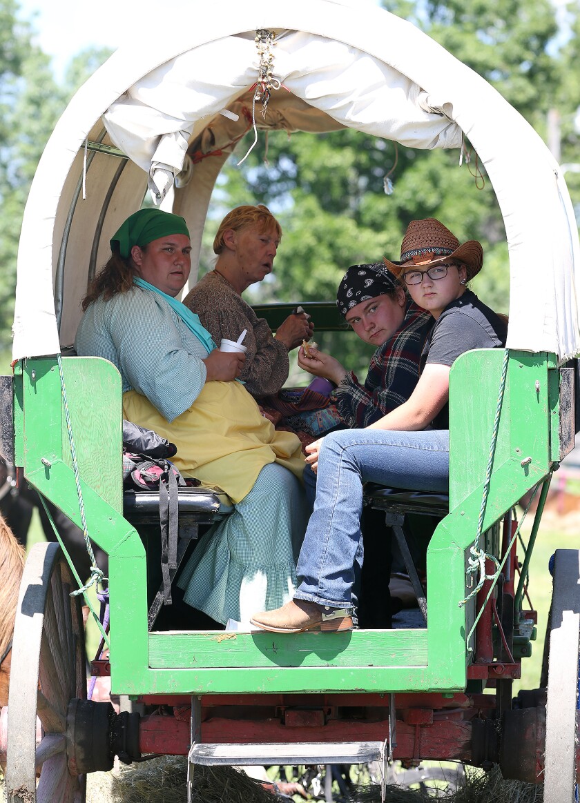fort seward wagon train wed sitting in wagon 062222.jpg