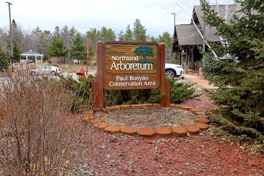 A sign near the front of the Northland Arboretum.