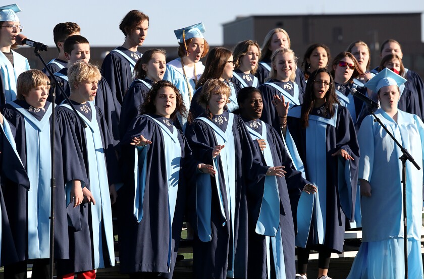 The Spartan choir sings “Bridge over troubled waters” during Superior High School’s Commencement Exercise
