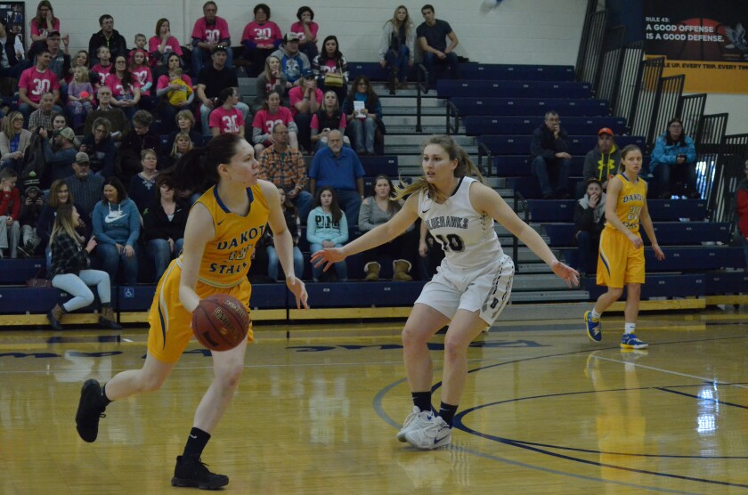 Dickinson State junior Lacey Waid guards a Dakota State player on Saturday, Jan. 27 at Scott Gymnasium. (Shelby Reardon / The Dickinson State)
