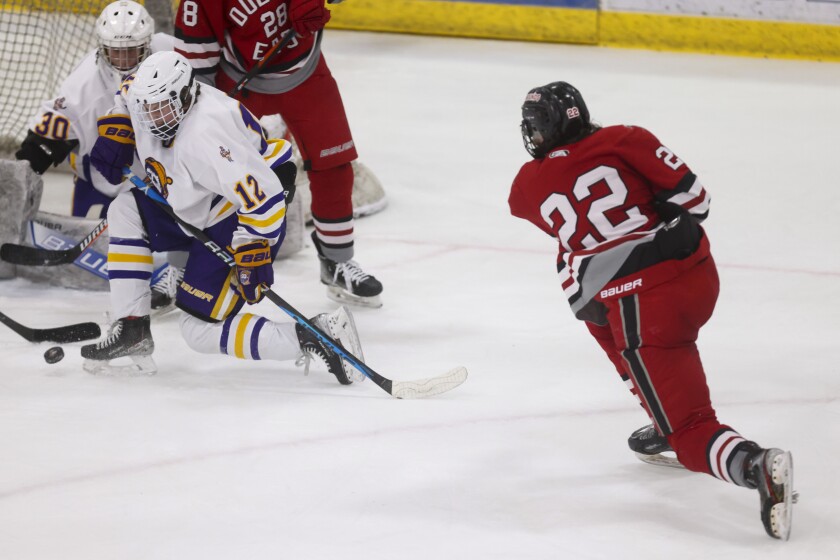 high school boys play hockey