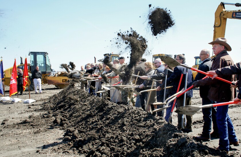 Sens. Heidi Heitkamp, from left, and John Hoeven speak with opponents of the Fargo-Moorhead Diversion prior to the projects groundbreaking ceremony Monday, April 17, 2017, on the flood diversion at the site of the dam inlet structure south of Horace, N.D.Michael Vosburg / Forum Photo Editor