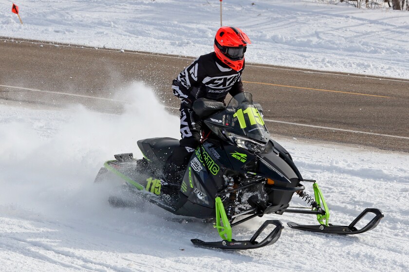 Snowmobilers race