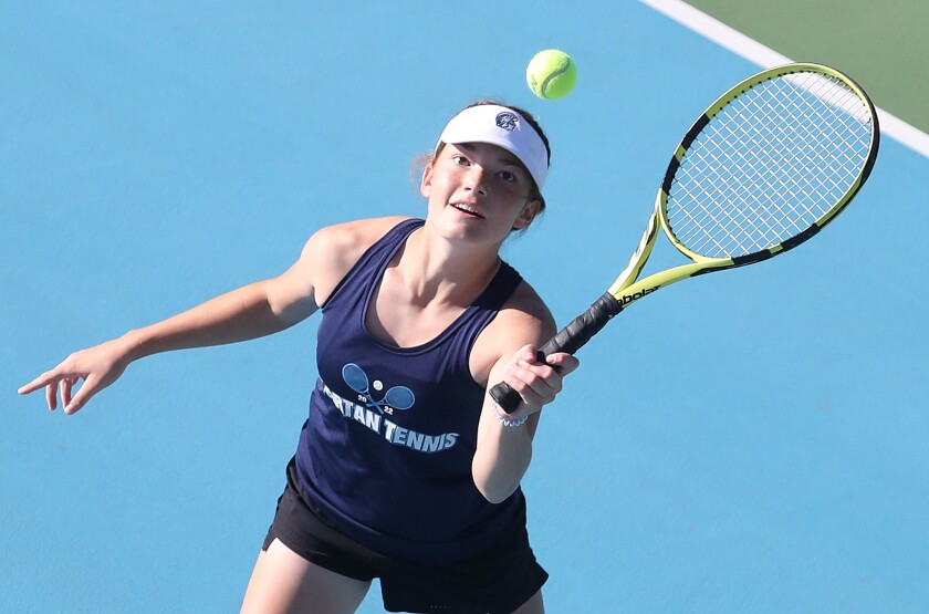 Superior’s Mattie Schilling eyes up the ball as she returns a shot during her match at no.1 doubles