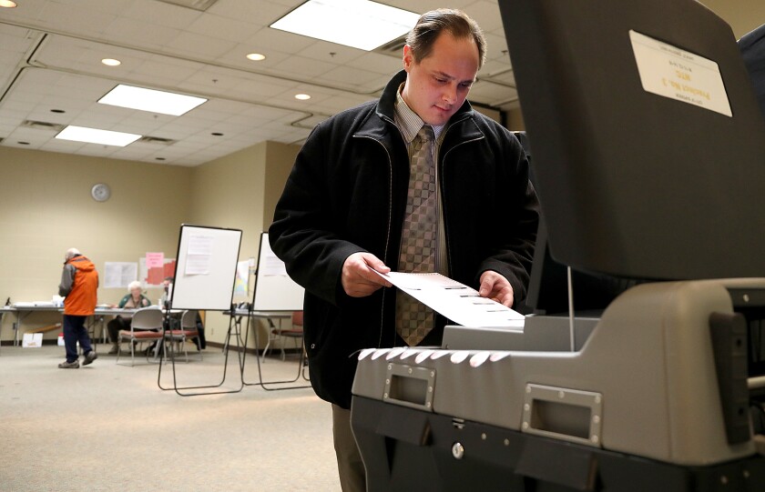 Lucas Mertz casts his ballot