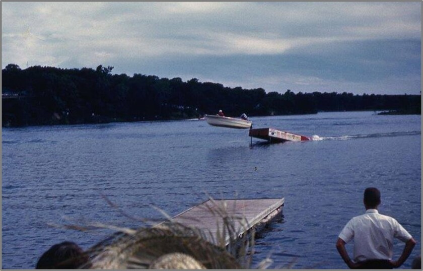 A boat goes aerial over a ramp in Lake Lake Redwood during the Redwood in Centennial 1964.