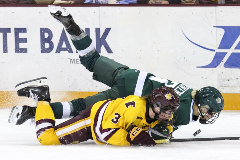 college women play ice hockey