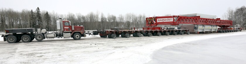Moving the boiler (the silver object) required a rig 350 feet long. Steve Kuchera / skuchera@duluthnews.com
