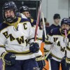 high school boys play ice hockey
