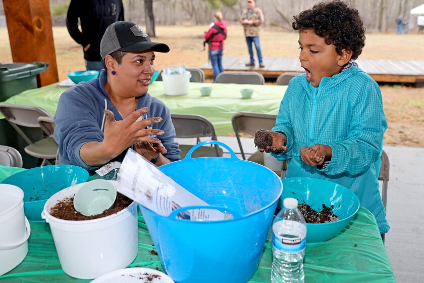 Earth Day activities at Rotary Riverside Park in Brainerd.