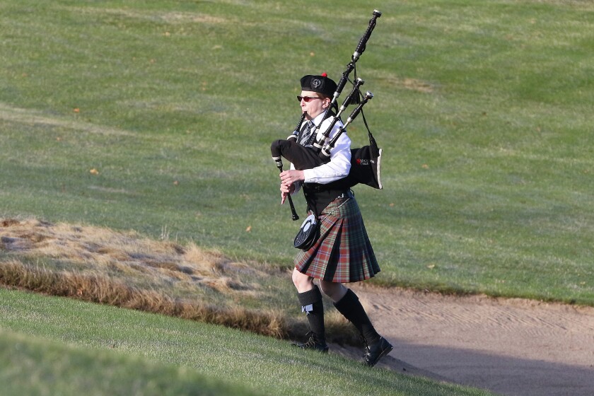 Bagpiper Meridith Richmond from the Macalester College Pipe Band makes her way in from the Madden’s Pine Beach East Course to the Madden Inn and Golf Club Saturday heralding the start of golf season. Kelly Humphrey/Brainerd Dispatch - Video