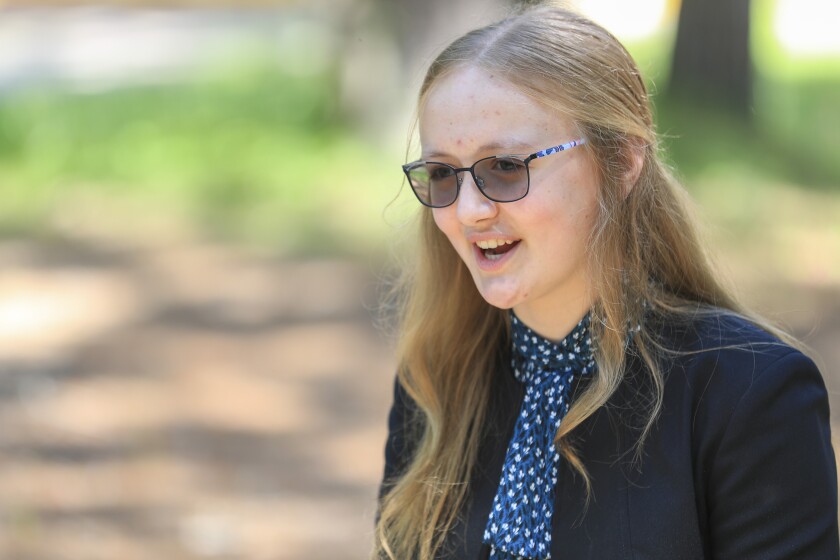 Person talking in outdoor setting