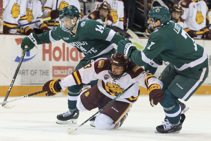 college men play hockey