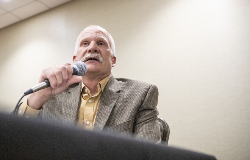 Dale Anderson, who is running for a seat on the Kandiyohi County Commission, speaks to the audience during candidate introductions during a forum at the Willmar Conference Center on Friday, July 29, 2022.
