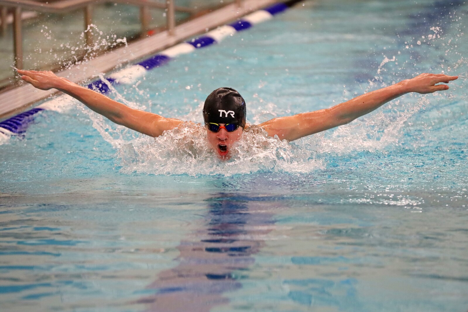 Swimmer in the pool competing.