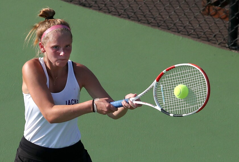 Cloquet’s Araya Kiminski returns a shot during her match at one singles
