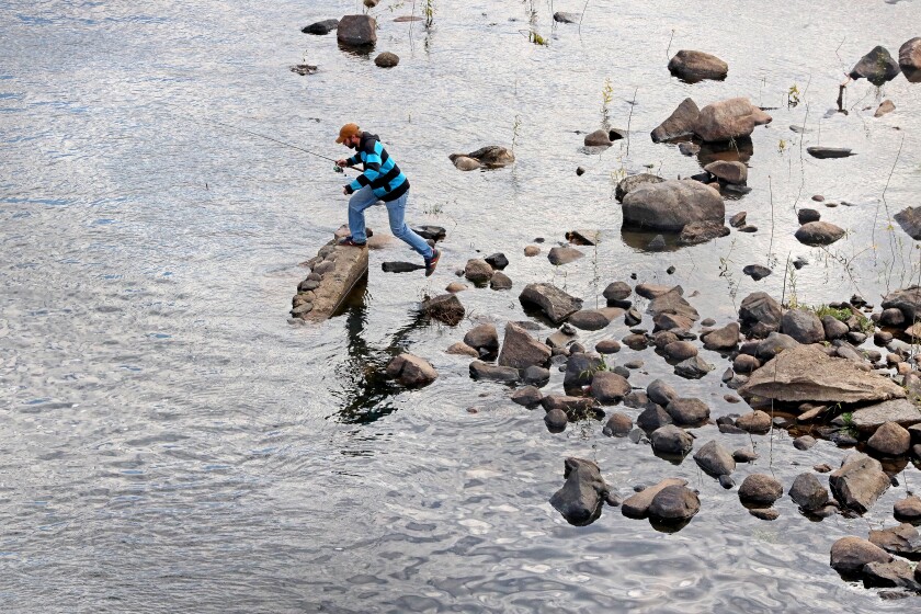 110221.N.BD.PrecariousFishing.jpg