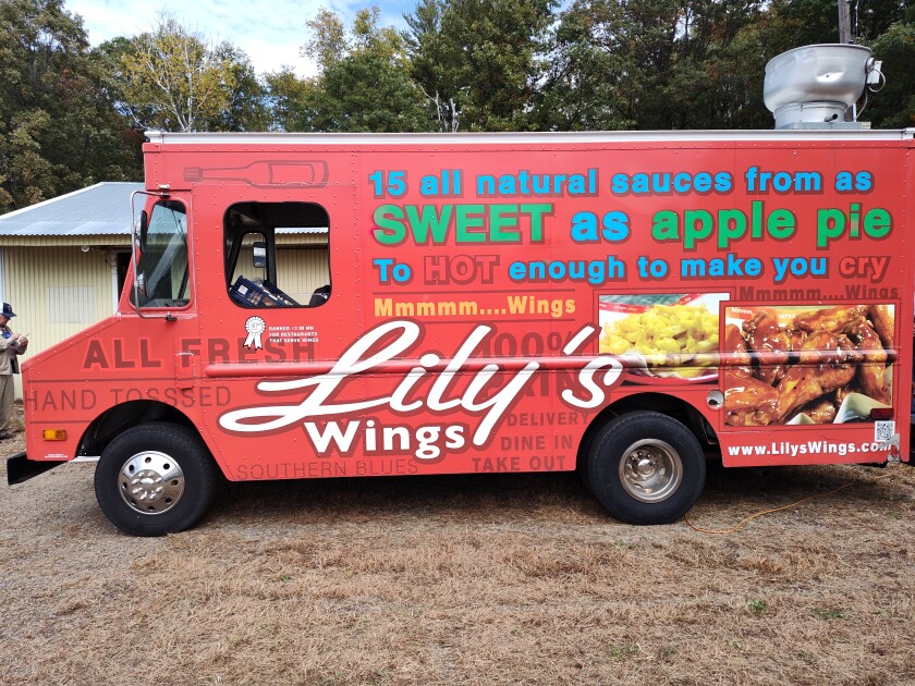 A Lily's Wings and Things food truck vehicle.